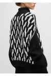 Virgin-wool sweater with two-tone cable structure