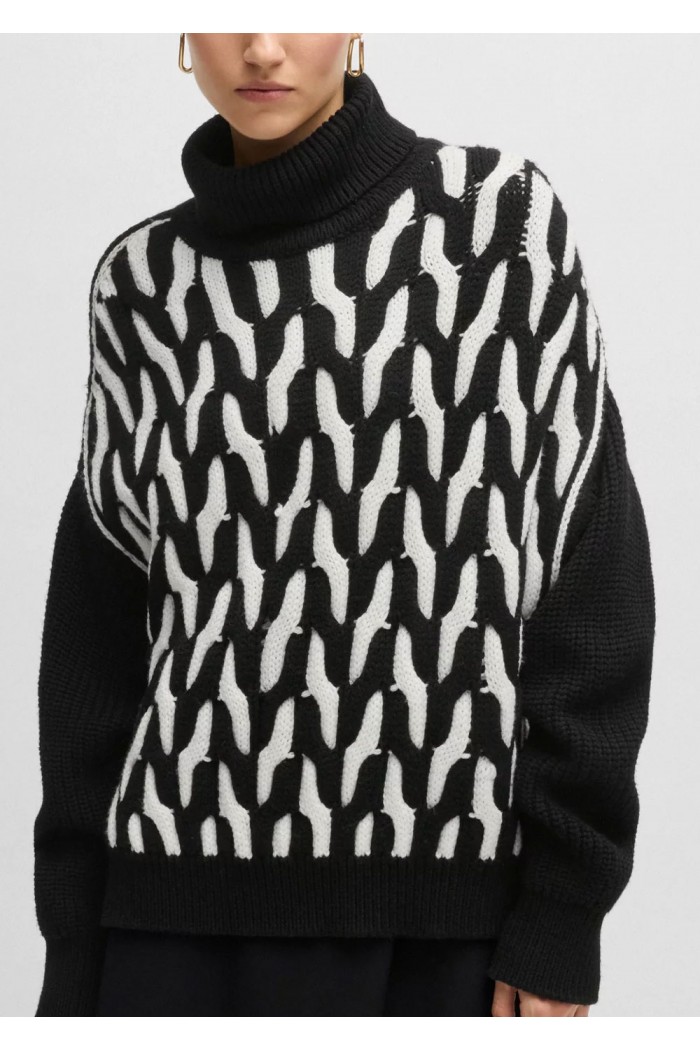 Virgin-wool sweater with two-tone cable structure
