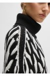Virgin-wool sweater with two-tone cable structure