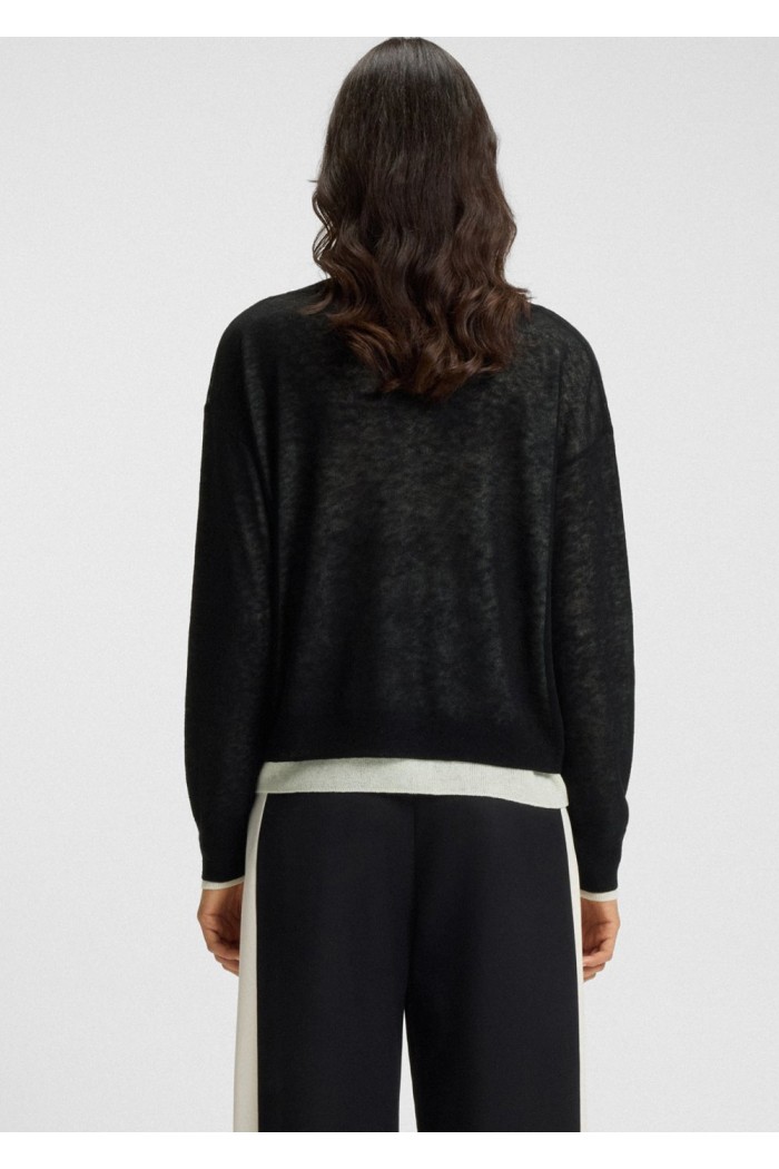 Knitted sweater with layered design