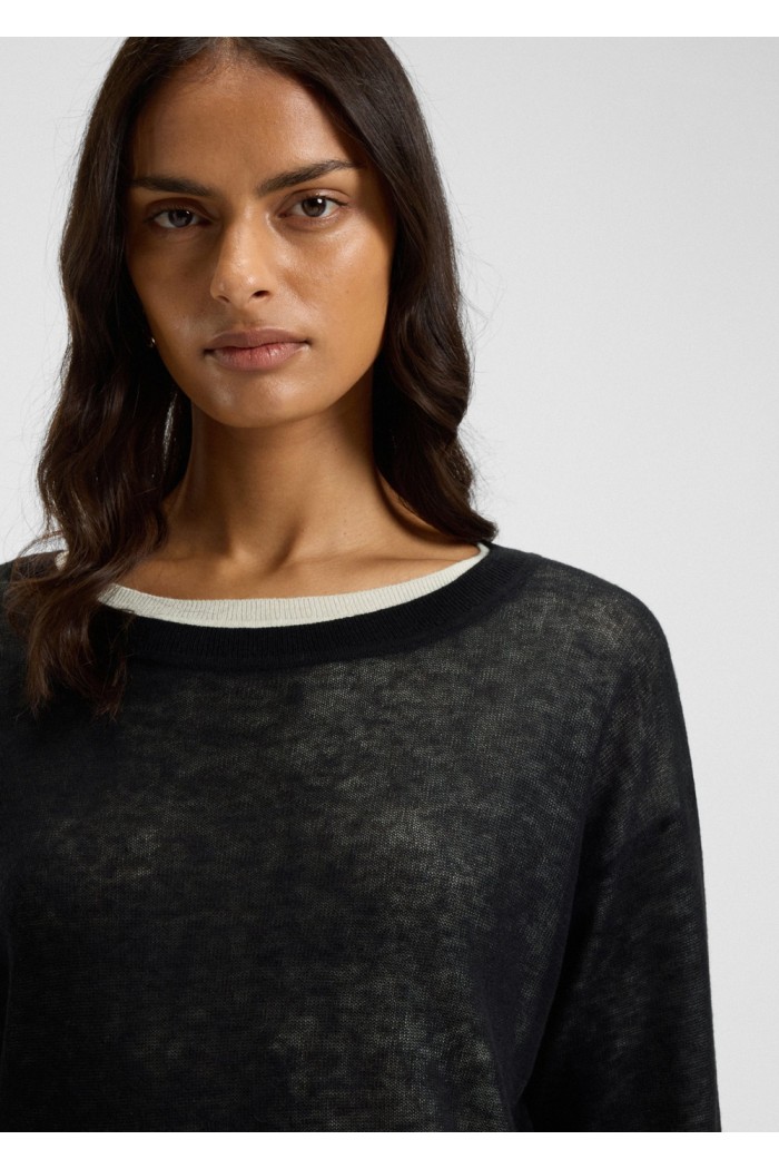 Knitted sweater with layered design