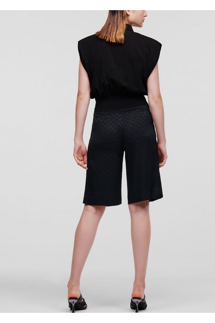CROPPED SLEEVELESS BLACK SHIRT WITH SHOULDER PADS