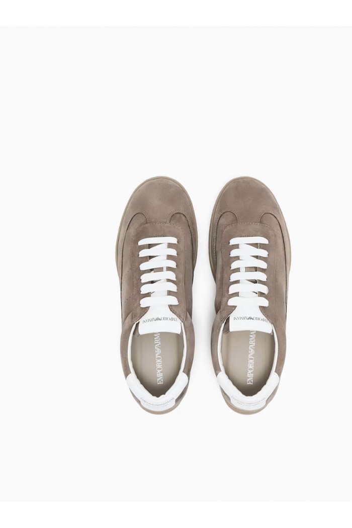 Nubuck sneakers with perforated details and a rubber sole