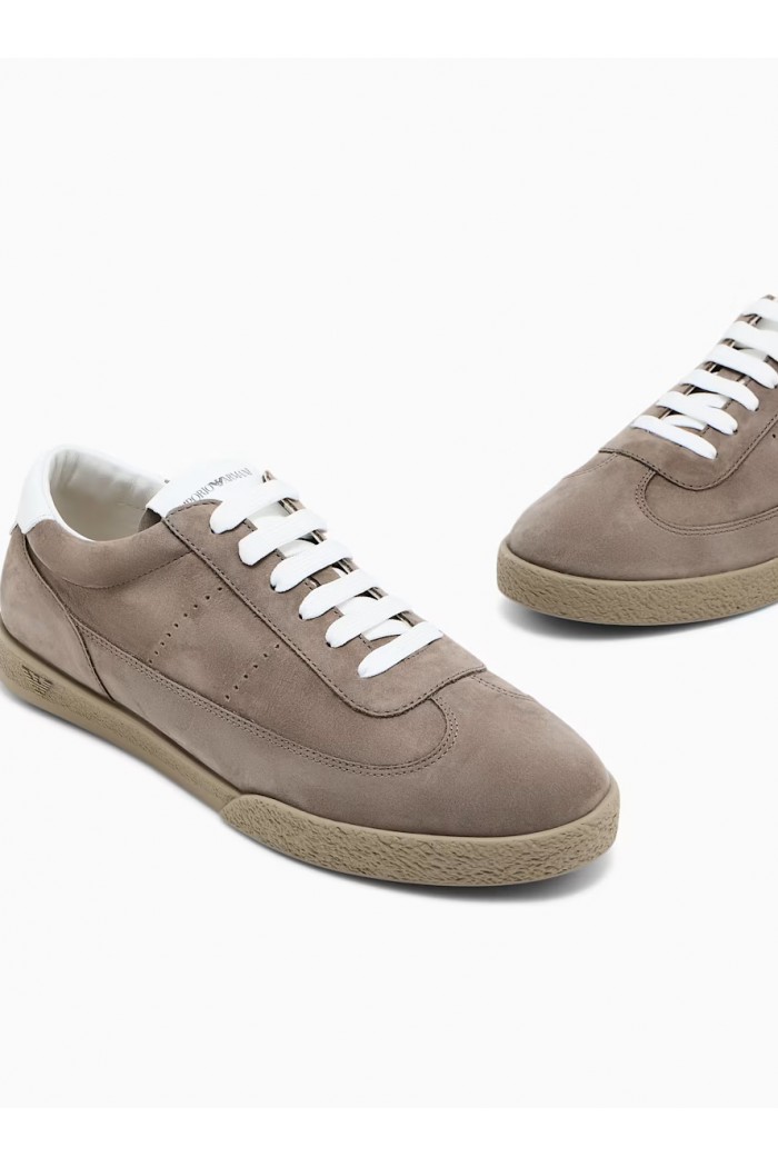 Nubuck sneakers with perforated details and a rubber sole