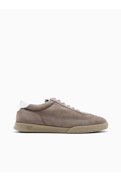 Nubuck sneakers with perforated details and a rubber sole