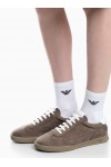 Nubuck sneakers with perforated details and a rubber sole