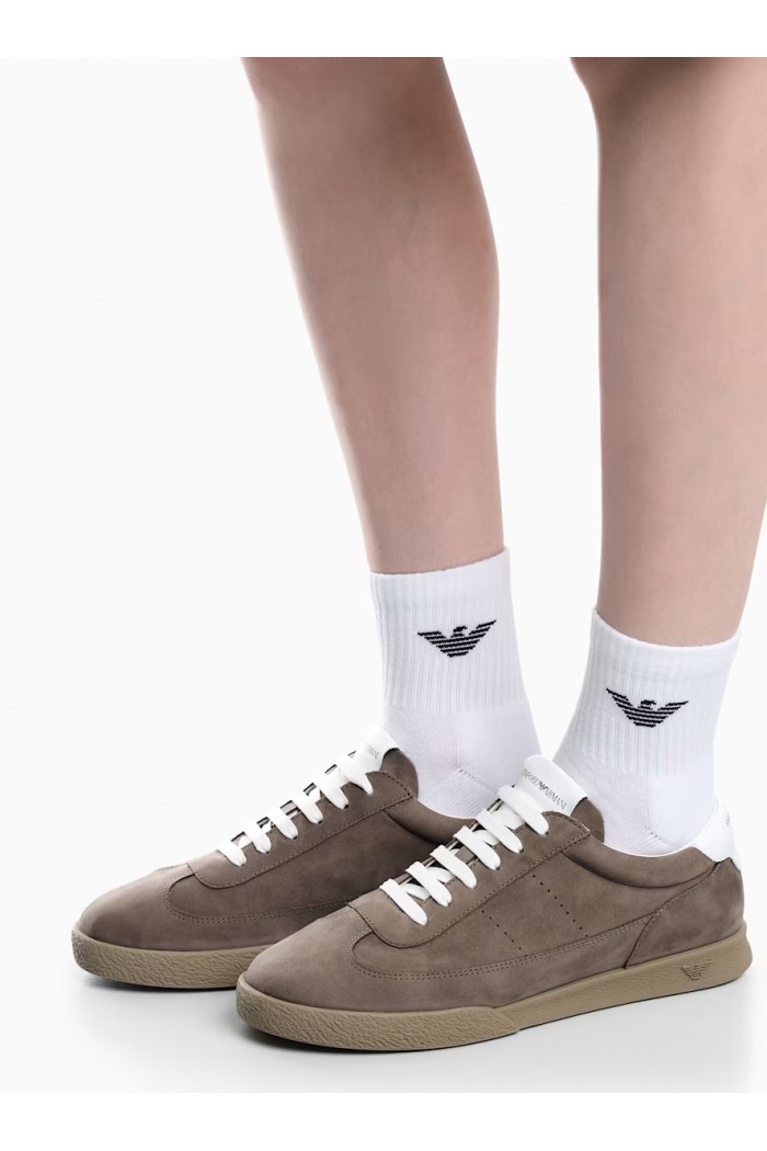 Nubuck sneakers with perforated details and a rubber sole