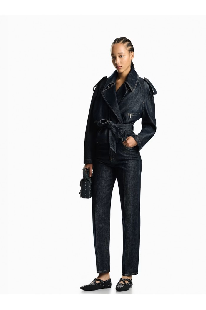 Five-pocket denim jeans with a metal knot on the waistband